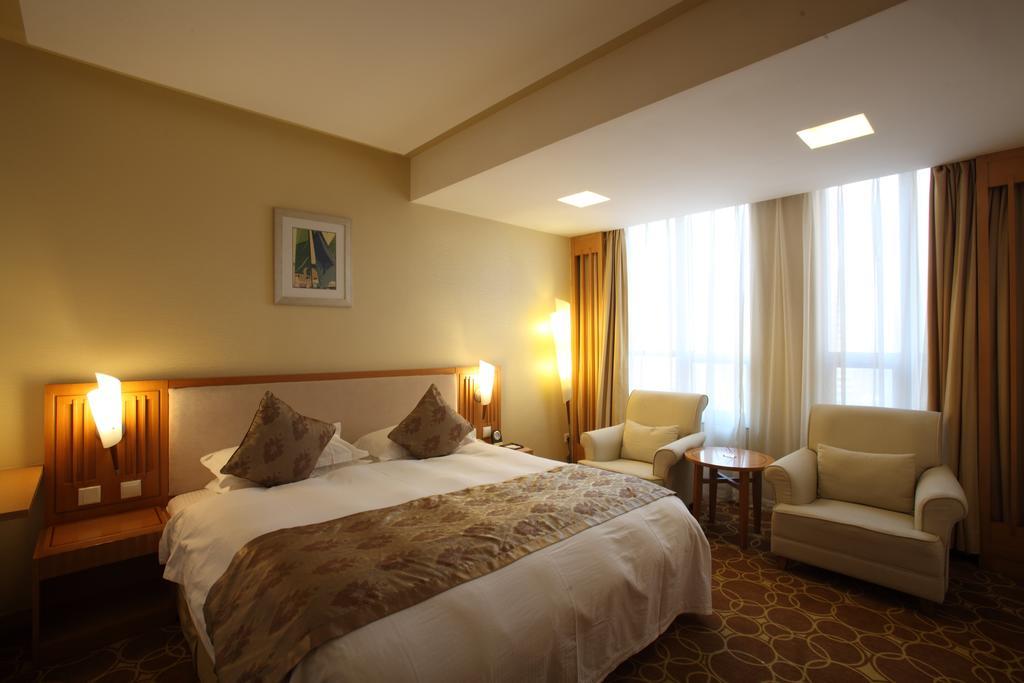 Beijing Wuhuan Hotel Номер фото