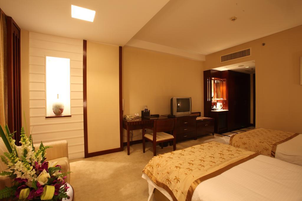 Beijing Wuhuan Hotel Номер фото