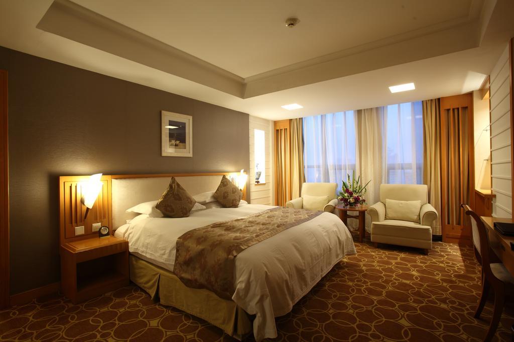 Beijing Wuhuan Hotel Номер фото