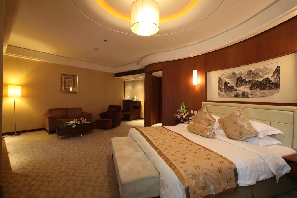 Beijing Wuhuan Hotel Номер фото