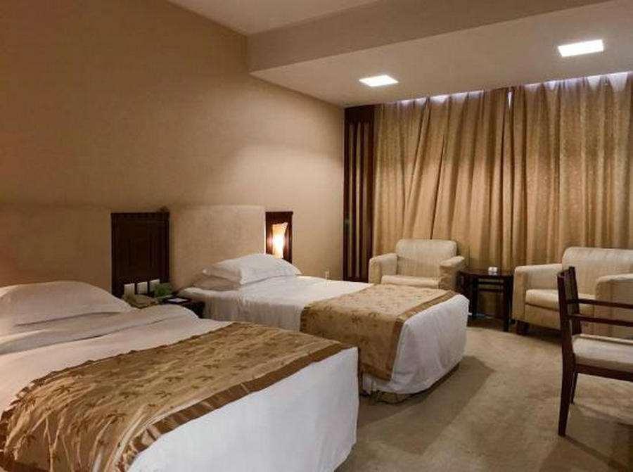 Beijing Wuhuan Hotel Номер фото