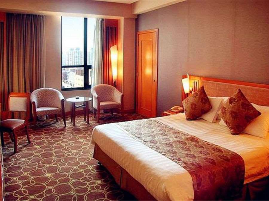 Beijing Wuhuan Hotel Номер фото