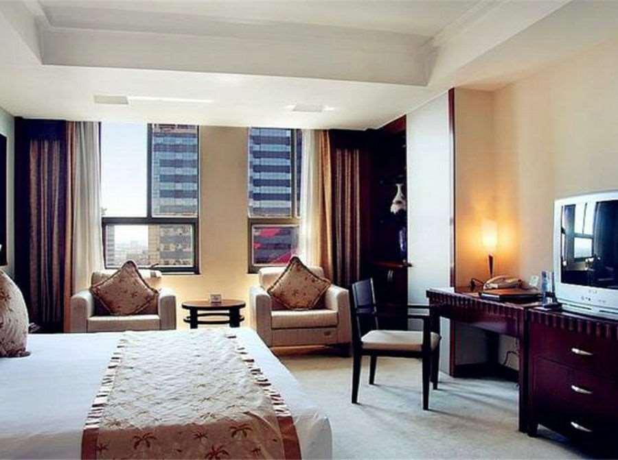 Beijing Wuhuan Hotel Номер фото