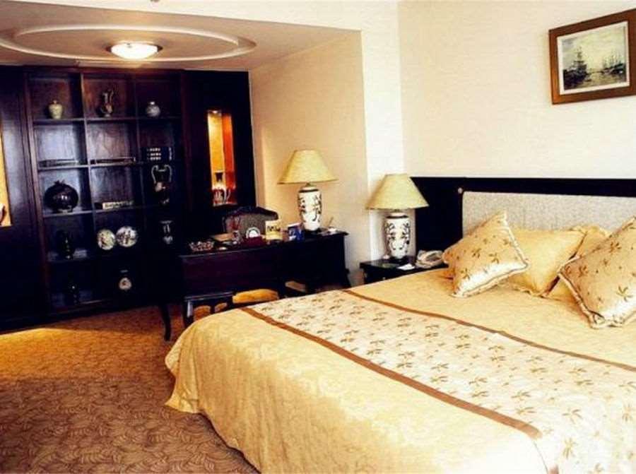Beijing Wuhuan Hotel Номер фото